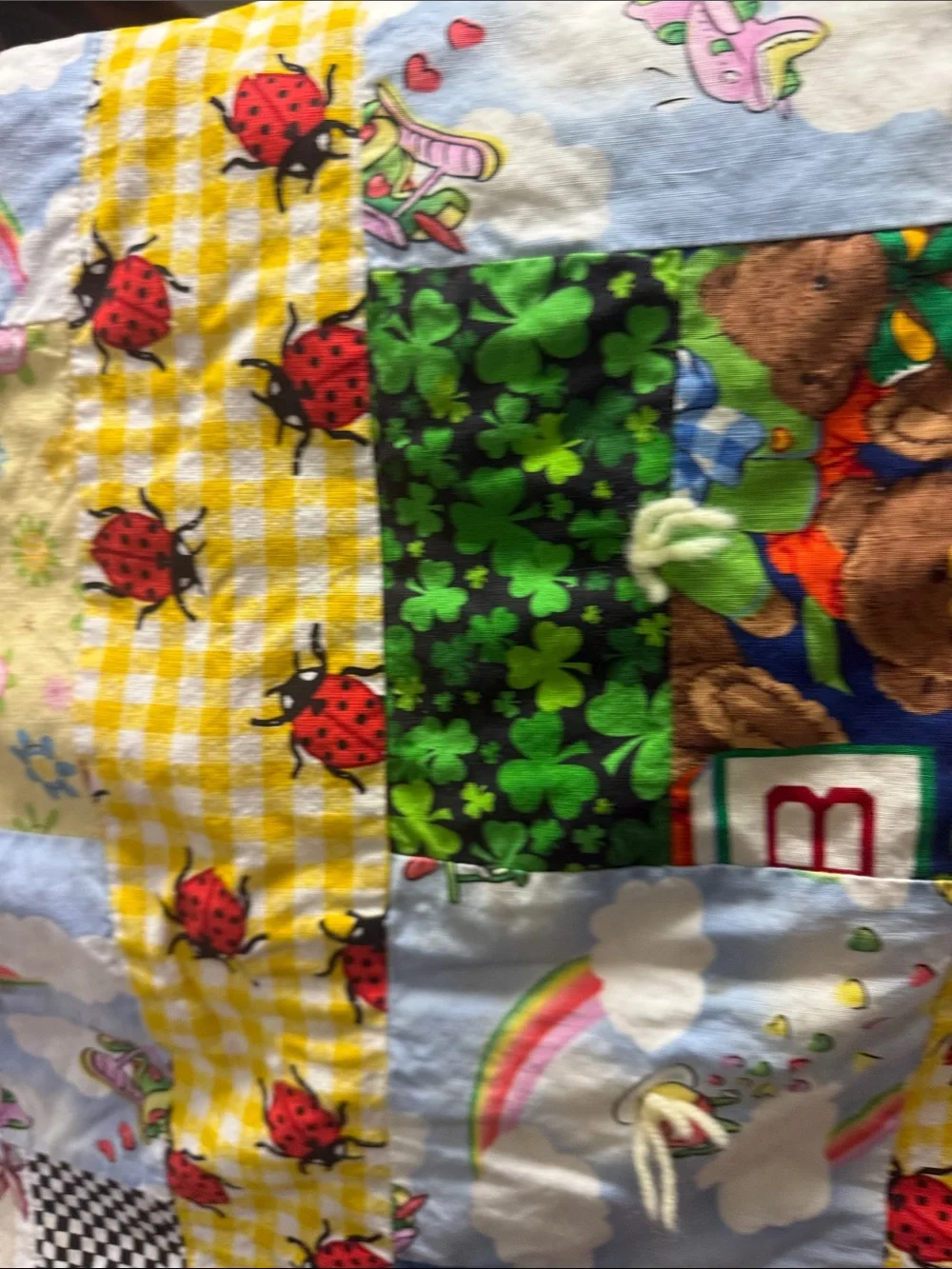 Colorful Ladybug Patchwork Quilt with Yellow Gingham Accents